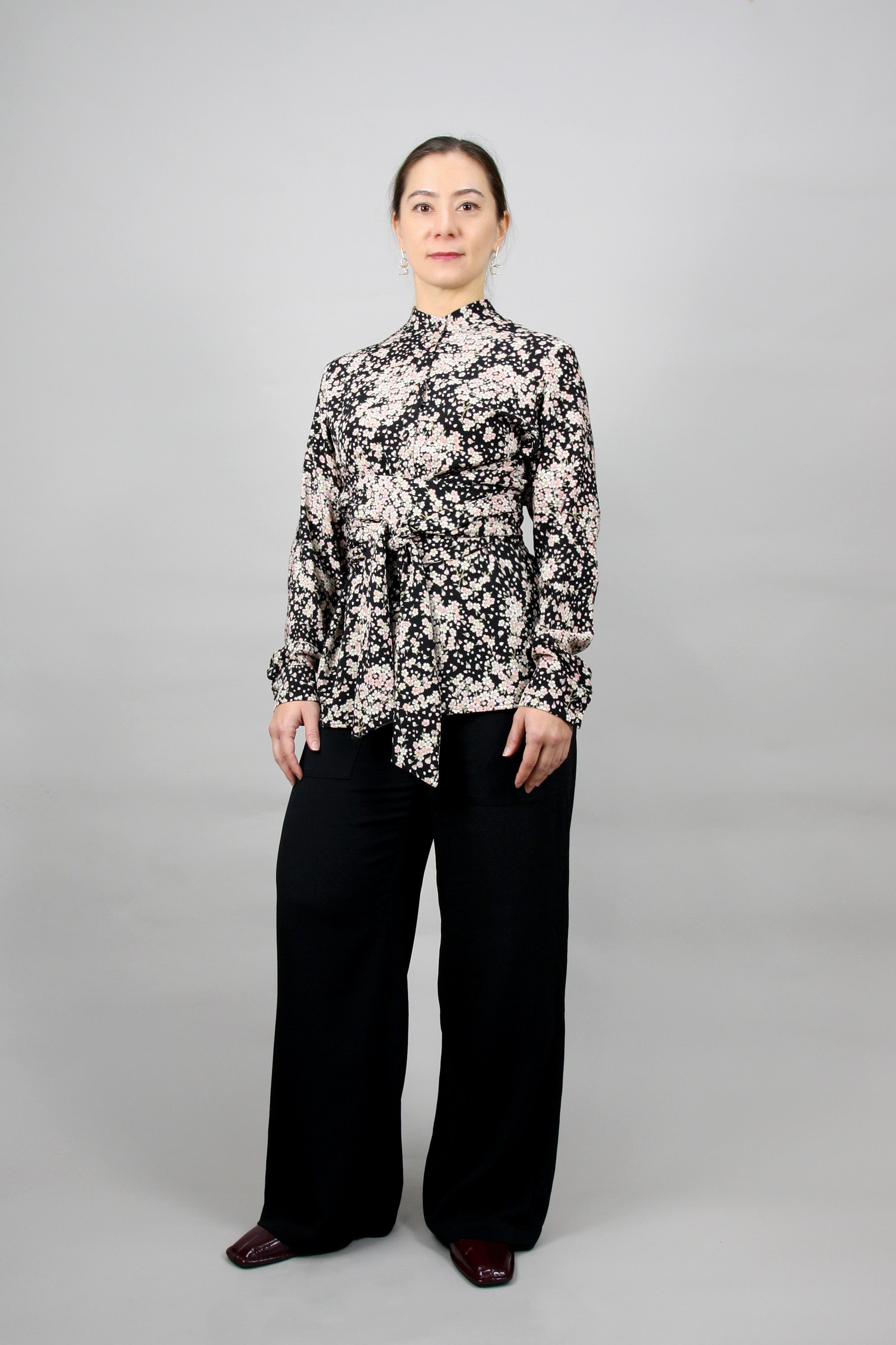 Signature Wickelbluse – Zeitlose Eleganz mit einem modernen Twist